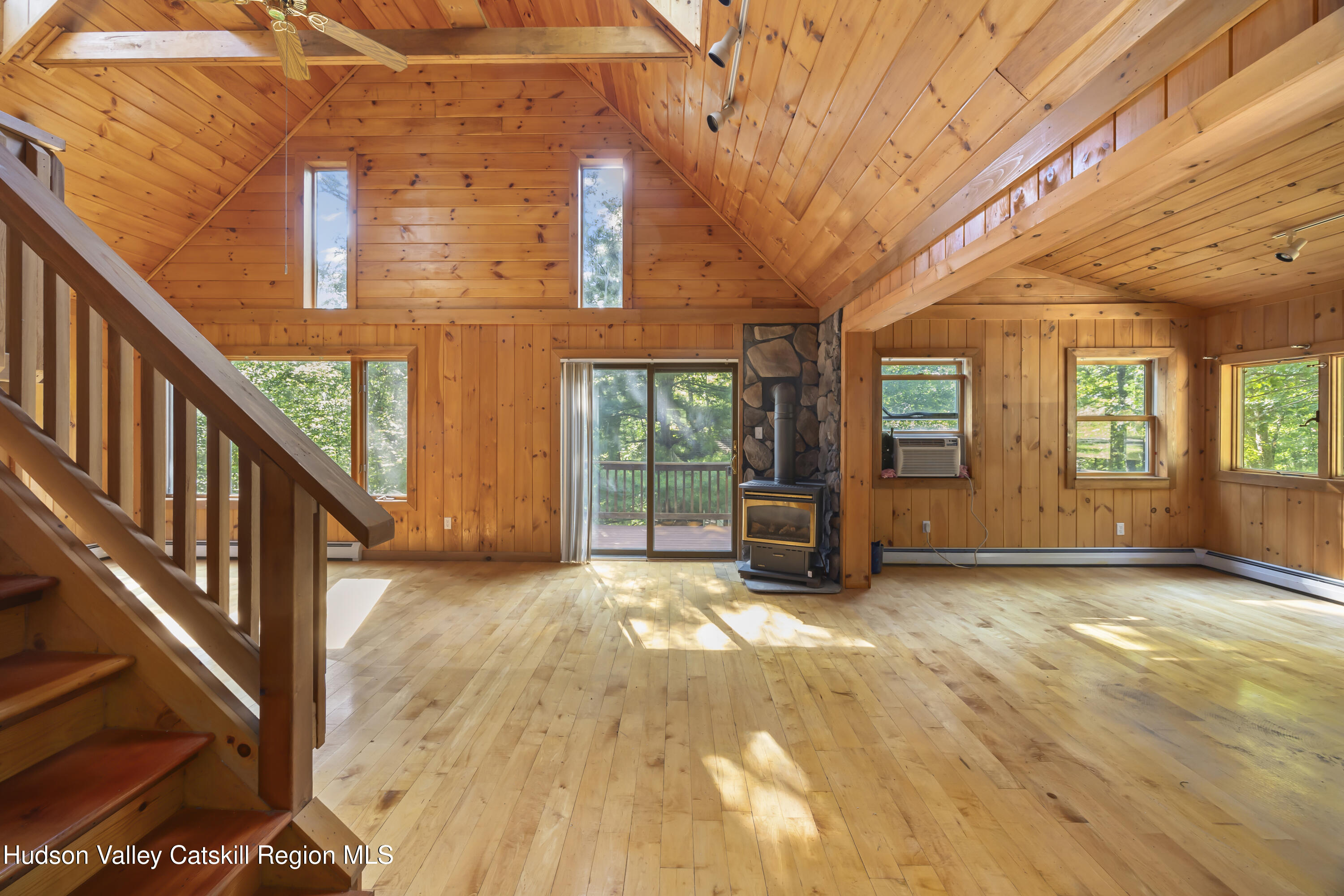 117 Spring Street Craryville, NY 12521 - Photo 9 of 31 a view of a house with porch and wooden floor