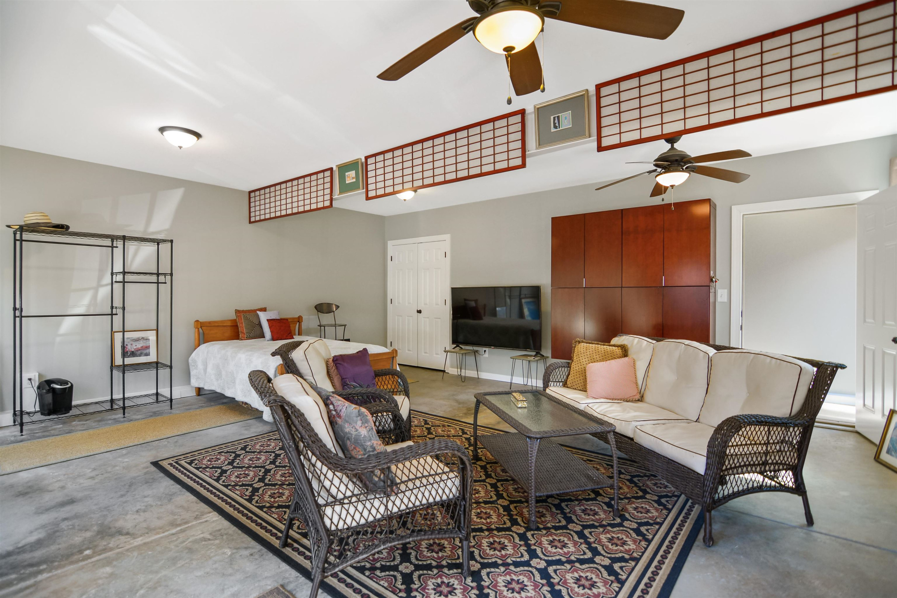 520 North Bloodworth Street Raleigh, NC 27604 - Photo 15 of 30 a living room with furniture and a flat screen tv
