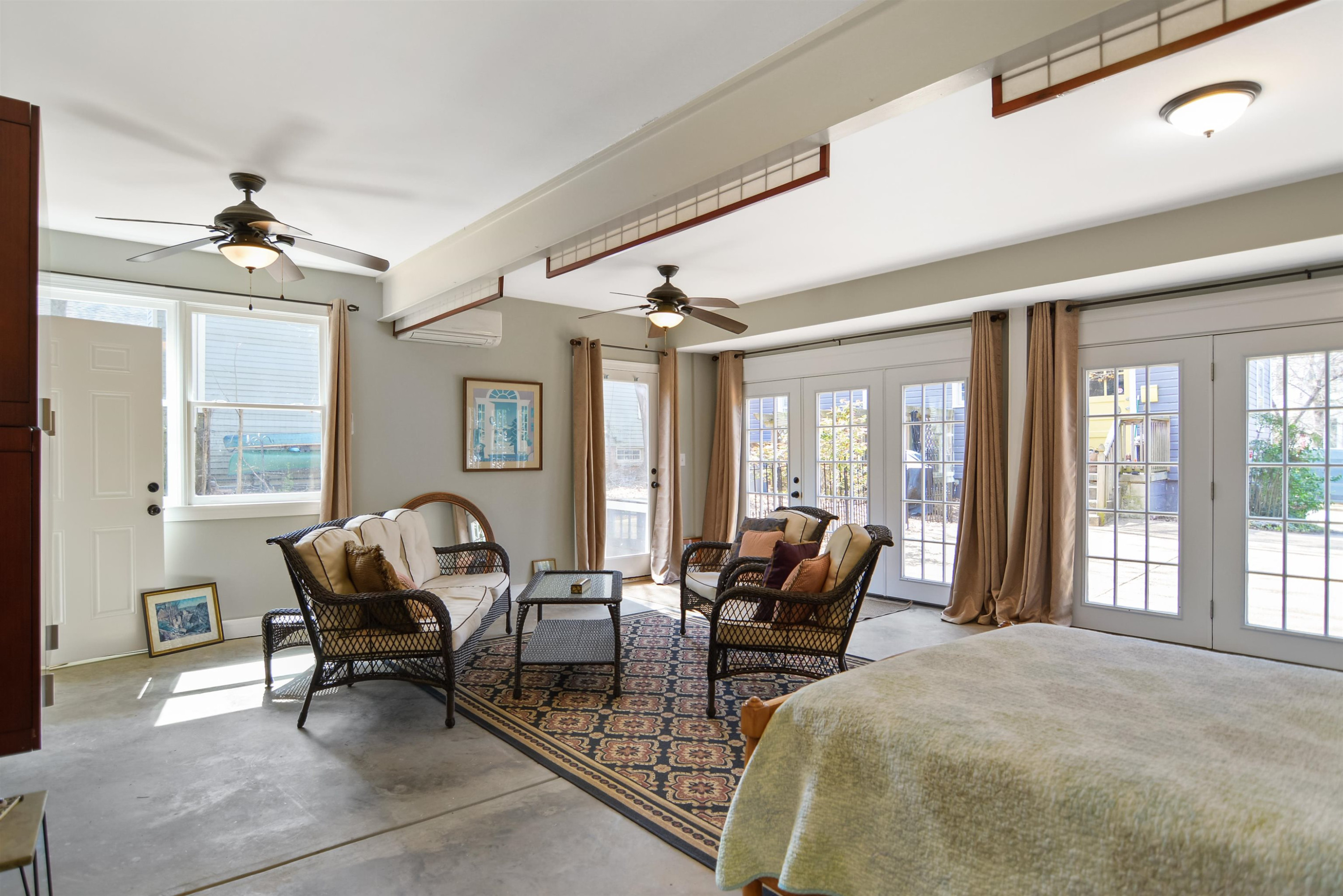 520 North Bloodworth Street Raleigh, NC 27604 - Photo 16 of 30 a living room with furniture and floor to ceiling windows