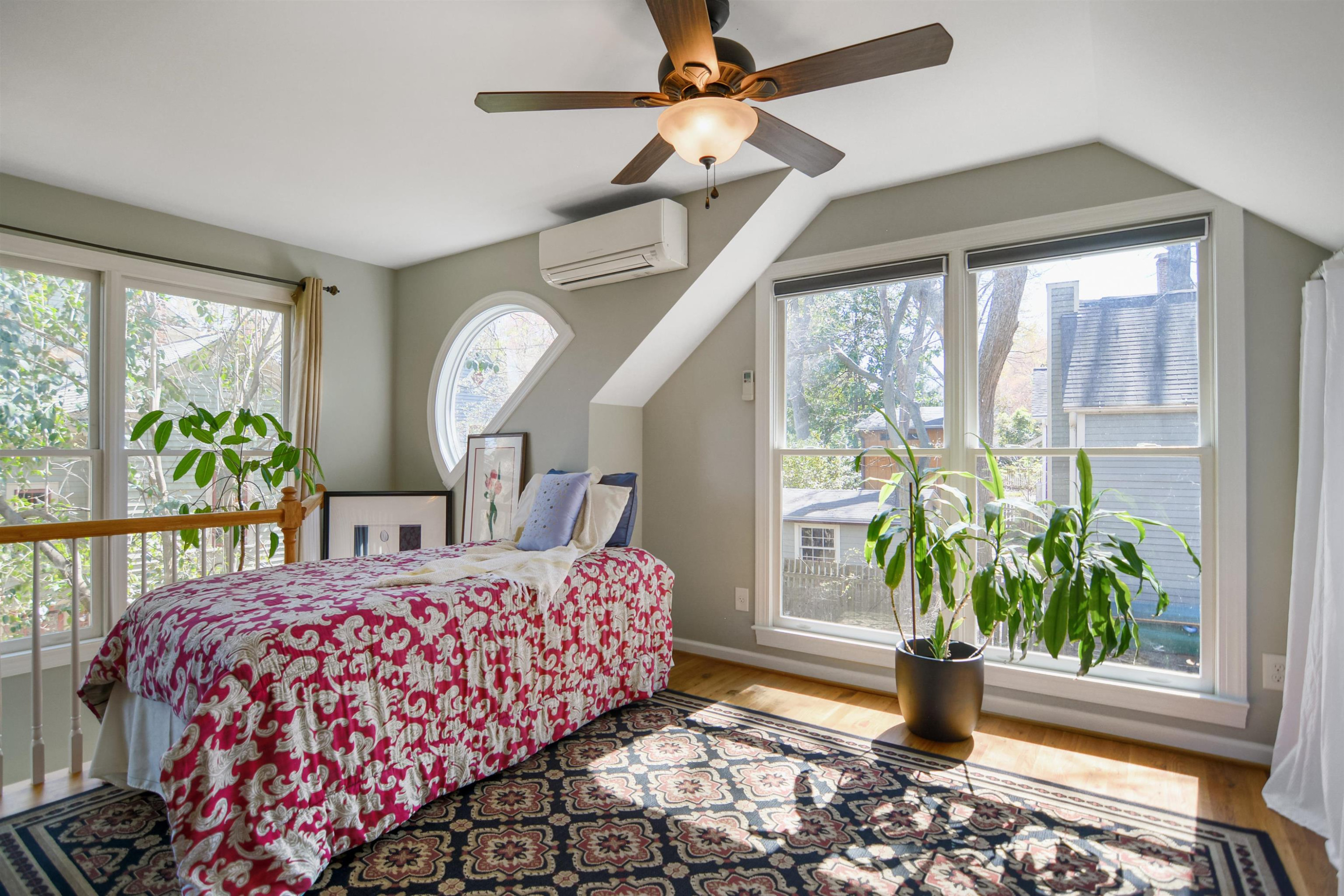 520 North Bloodworth Street Raleigh, NC 27604 - Photo 20 of 30 a bedroom with a bed and a potted plant