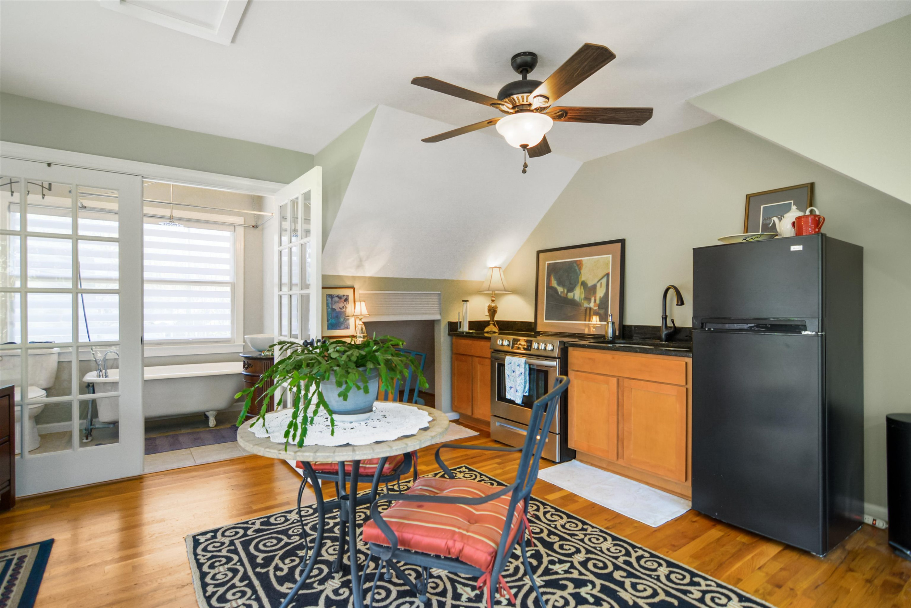 520 North Bloodworth Street Raleigh, NC 27604 - Photo 21 of 30 a living room with furniture a window and a table