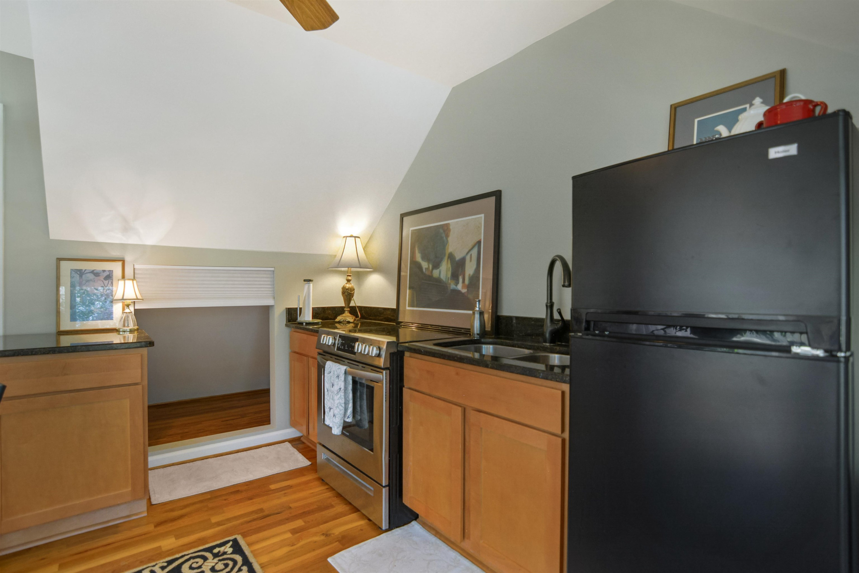 520 North Bloodworth Street Raleigh, NC 27604 - Photo 22 of 30 a kitchen with a sink appliances and cabinets
