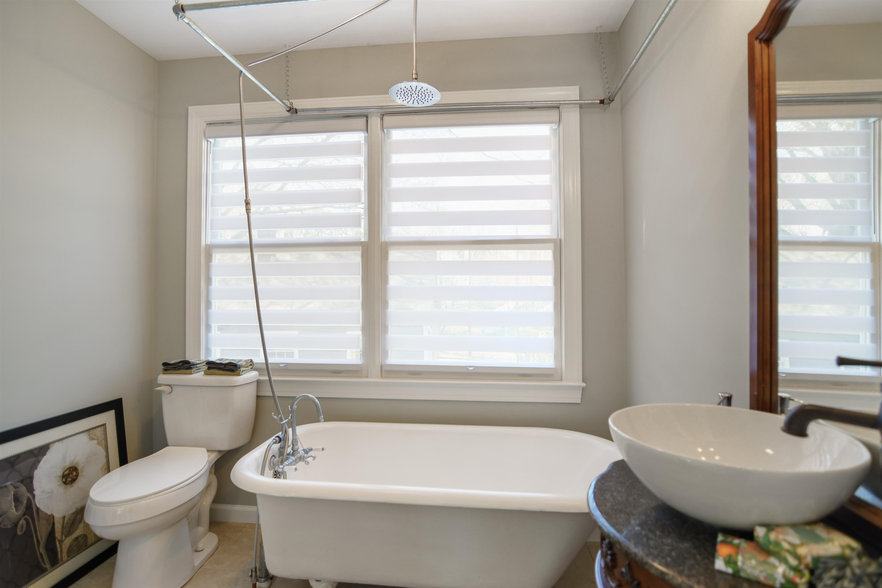 520 North Bloodworth Street Raleigh, NC 27604 - Photo 23 of 30 a bathroom with a sink a toilet a mirror and a tub