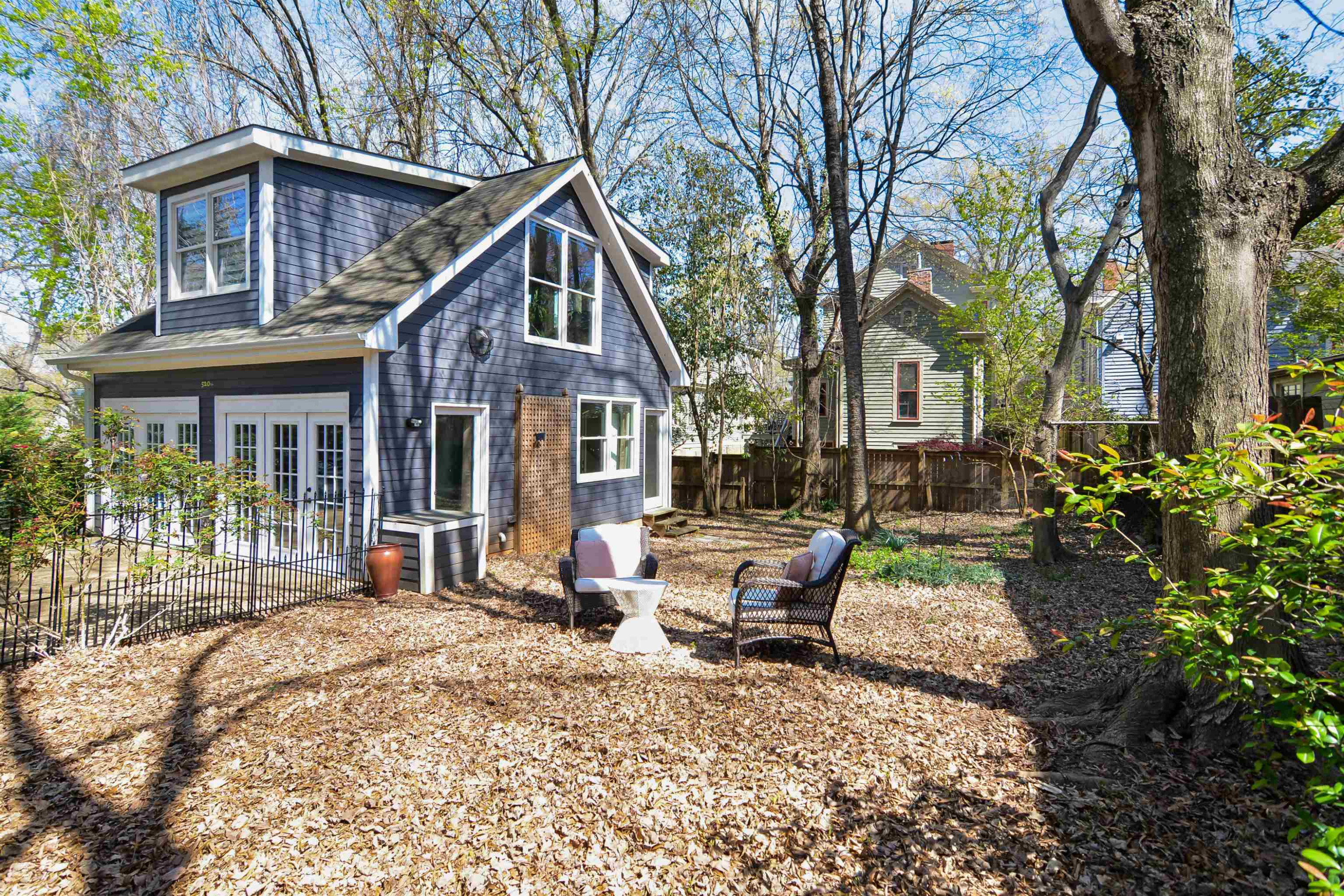 520 North Bloodworth Street Raleigh, NC 27604 - Photo 28 of 30 a view of a house with backyard sitting area and garden