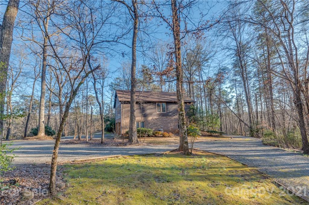 301 Willow Pond Road Rutherfordton, NC 28139 - Photo 2 of 42 a view of a fountain in middle of the yard