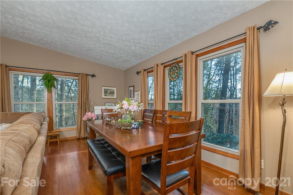 301 Willow Pond Road Rutherfordton, NC 28139 - Photo 18 of 42 a dining room with furniture and window