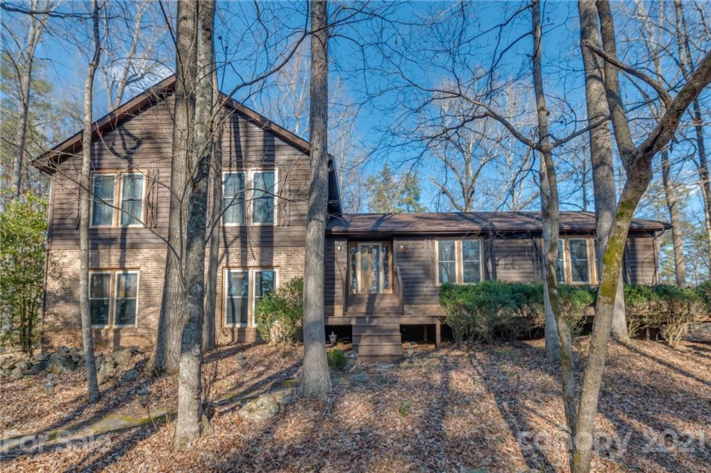 301 Willow Pond Road Rutherfordton, NC 28139 - Photo 5 of 42 a house view with a outdoor space