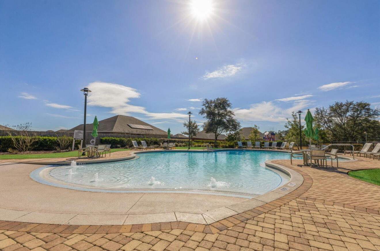 936 Merganser Way Crestview, FL 32539 - Photo 35 of 39 swimming pool view with a lake view