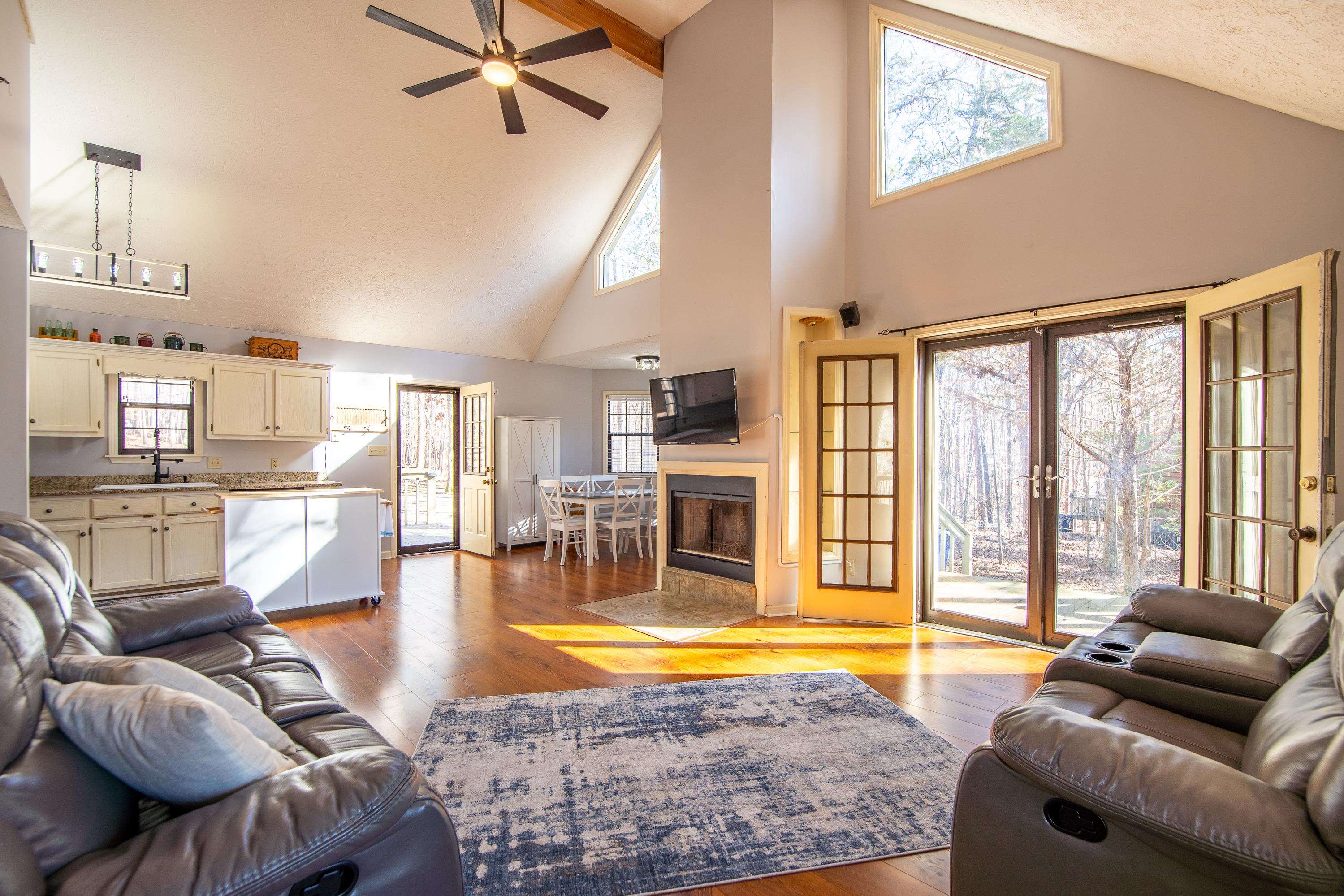 315 Bryson Harbor Road Counce, TN 38326 - Photo 12 of 37 a living room with furniture and a floor to ceiling window