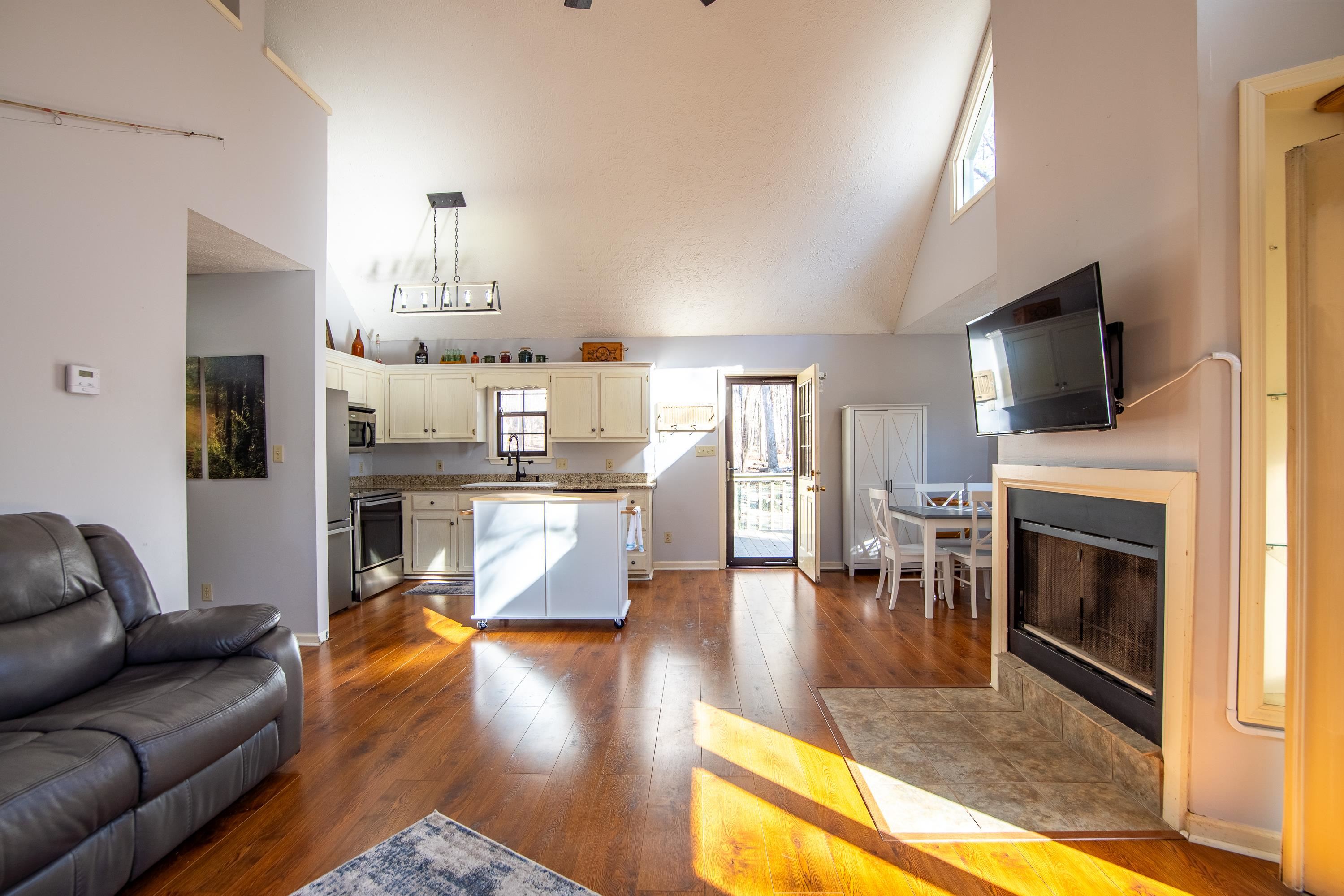 315 Bryson Harbor Road Counce, TN 38326 - Photo 13 of 37 a living room with furniture fireplace and flat screen tv