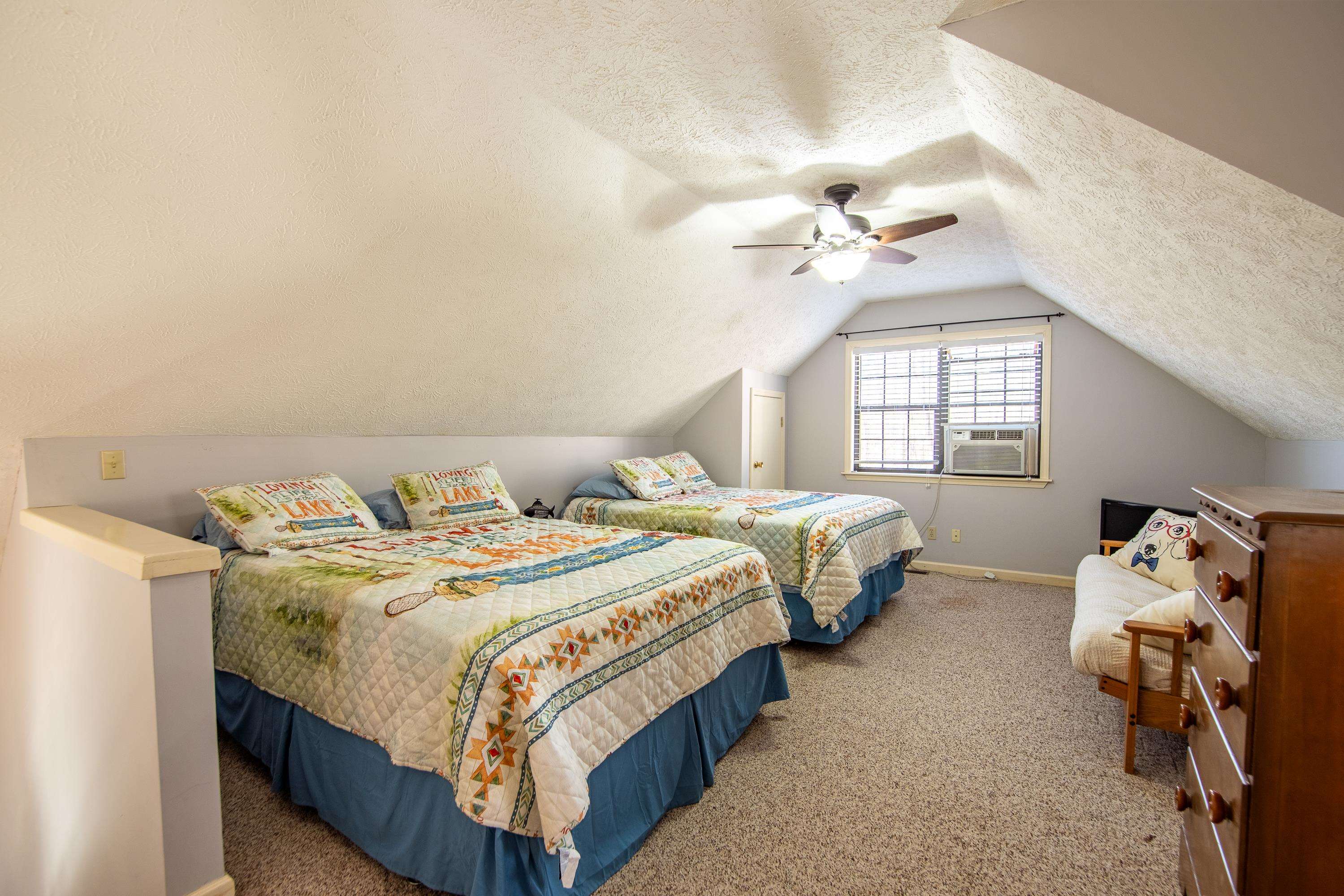 315 Bryson Harbor Road Counce, TN 38326 - Photo 22 of 37 a bedroom with bed and window