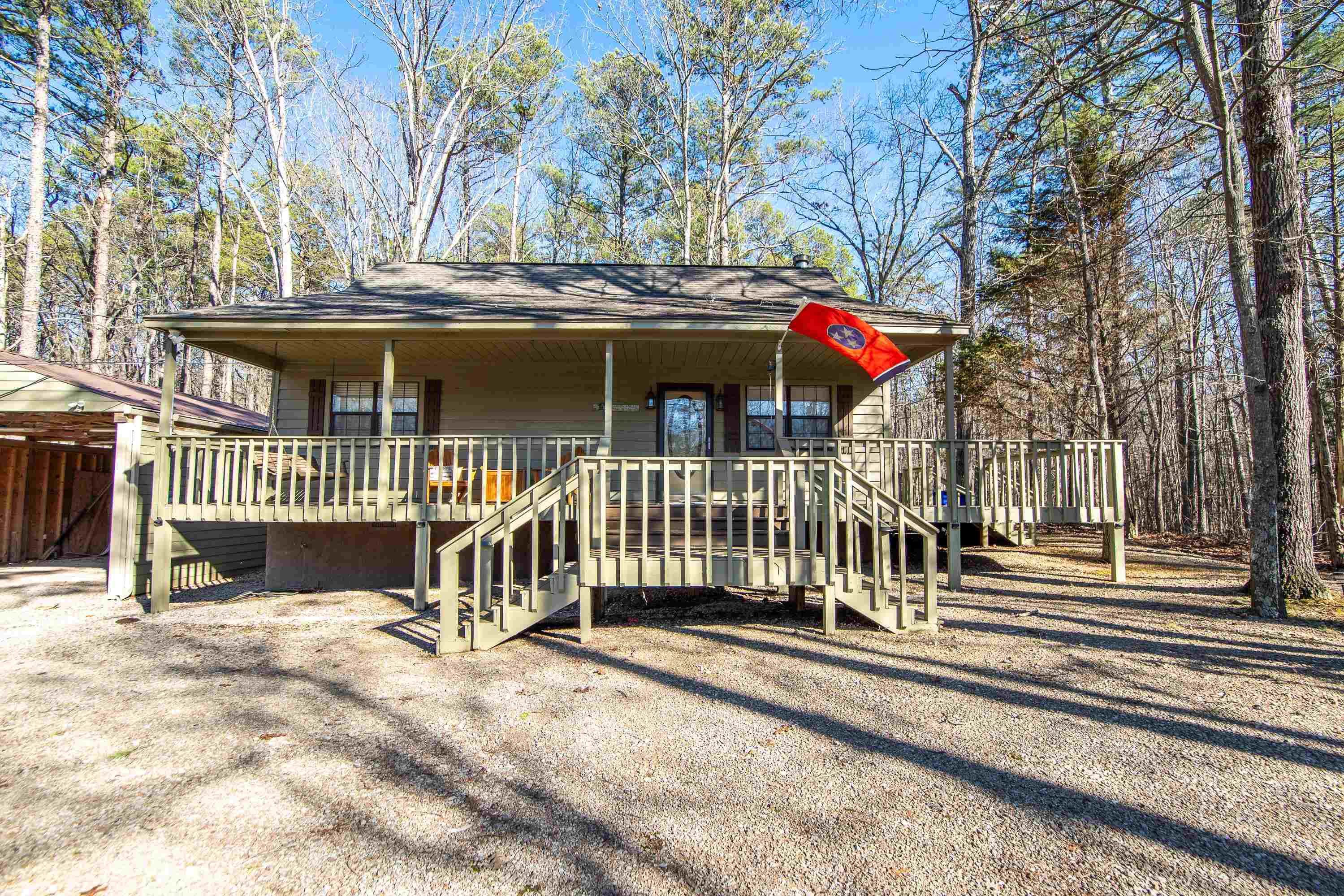 315 Bryson Harbor Road Counce, TN 38326 - Photo 4 of 37 a view of a house with a small yard and wooden fence