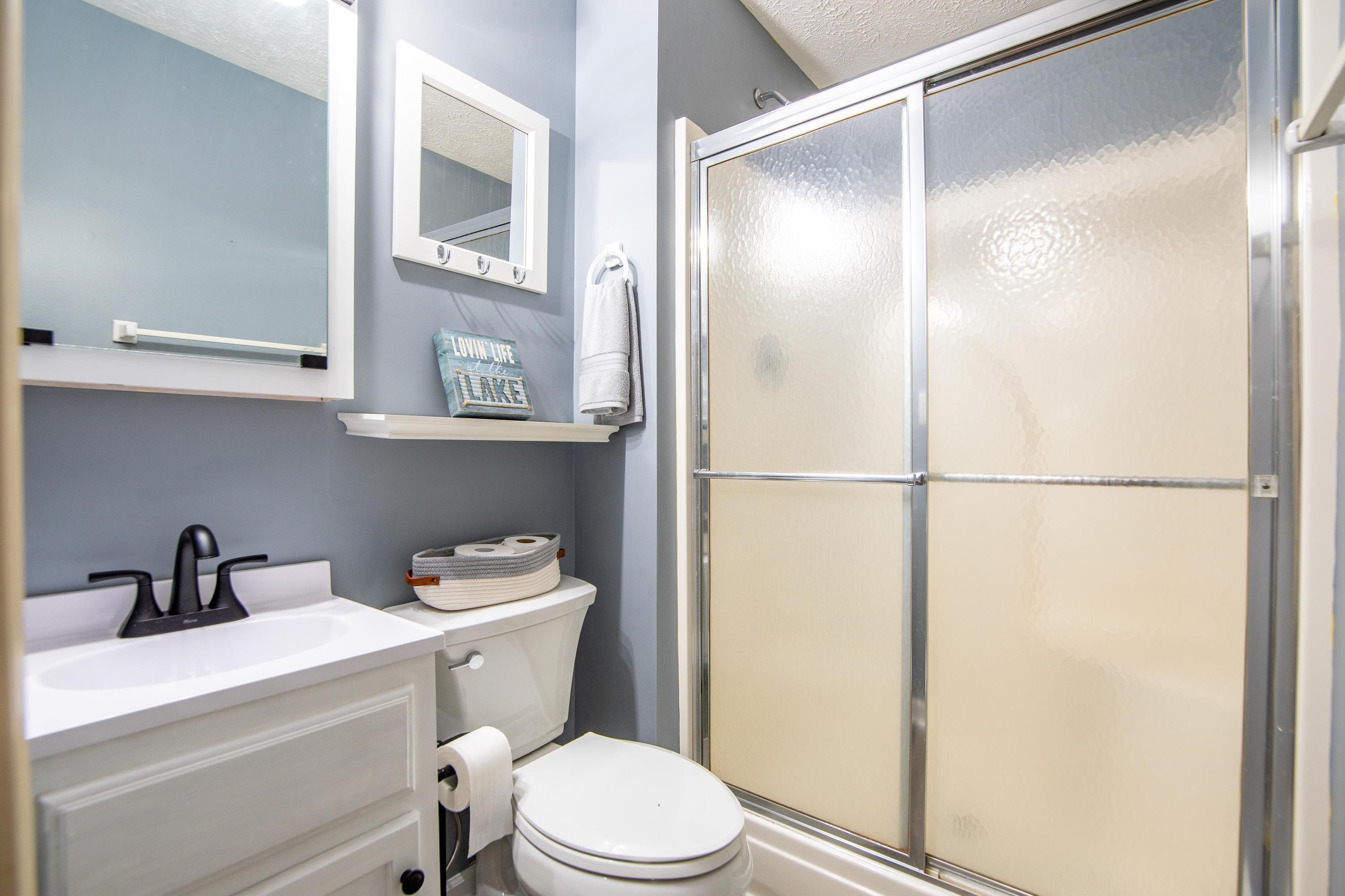 315 Bryson Harbor Road Counce, TN 38326 - Photo 9 of 37 a bathroom with a toilet a sink and vanity