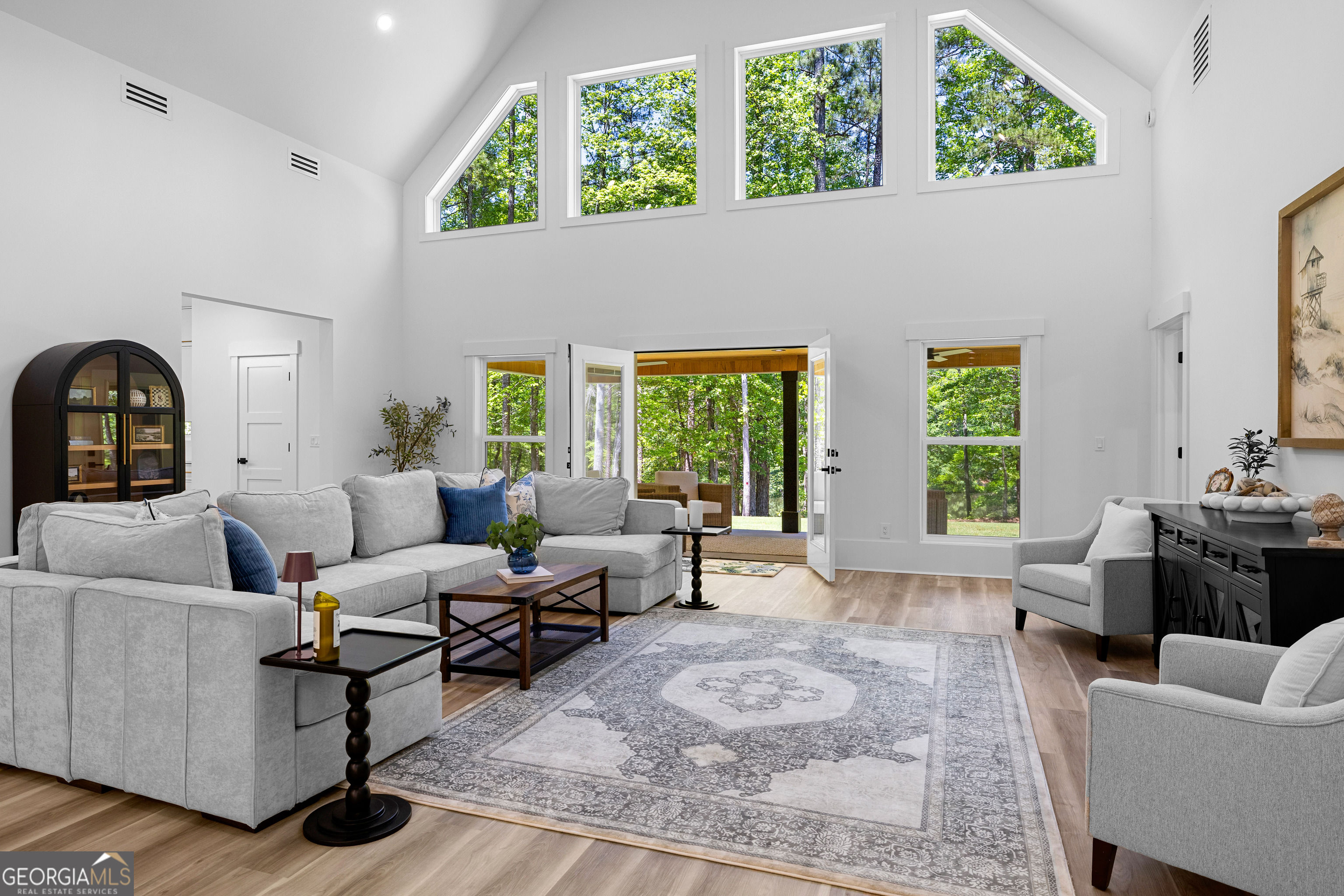 354 Turner Road Newnan, GA 30263 - Photo 58 of 79 a living room with furniture and a large window