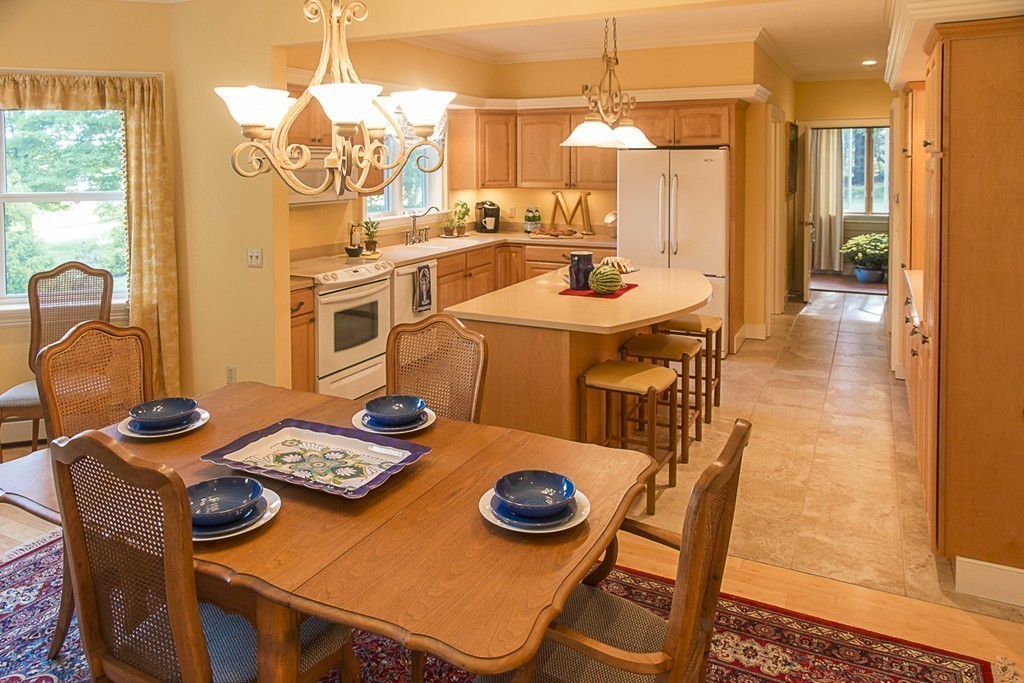 72 Old Stage Road Montague, MA 01351 - Photo 1 of 23 a view of a dining room with furniture and chandelier