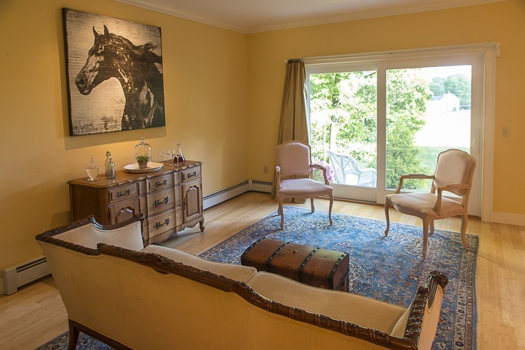 72 Old Stage Road Montague, MA 01351 - Photo 12 of 23 a living room with furniture and a window