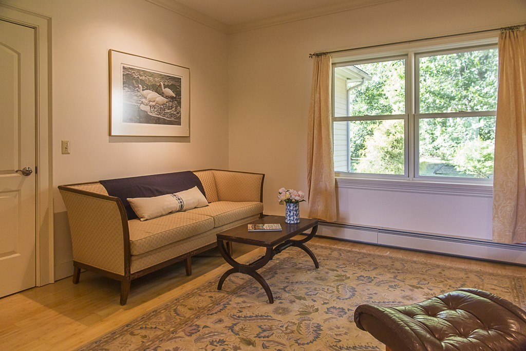 72 Old Stage Road Montague, MA 01351 - Photo 16 of 23 a living room with furniture and a window