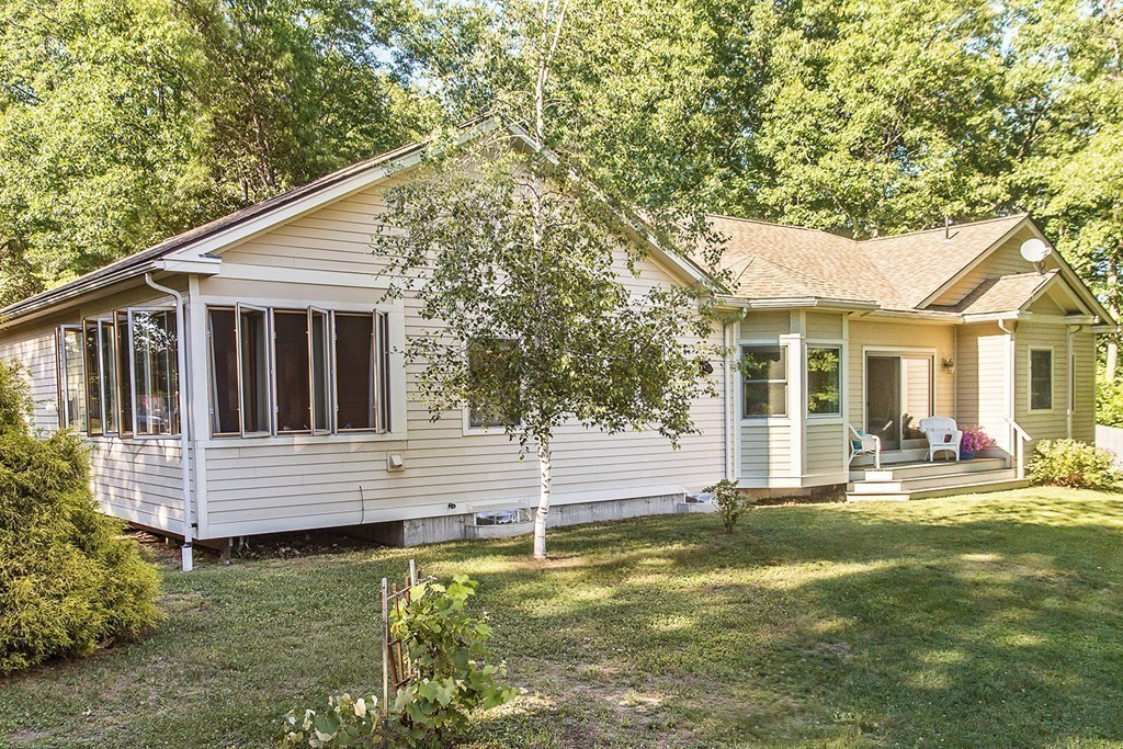 72 Old Stage Road Montague, MA 01351 - Photo 5 of 23 a view of a house with a yard patio and fire pit