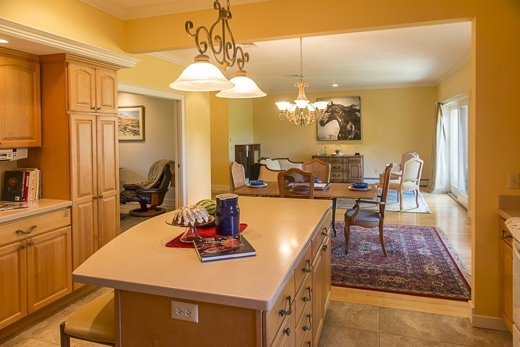 72 Old Stage Road Montague, MA 01351 - Photo 7 of 23 a view of a dining room with furniture and chandelier