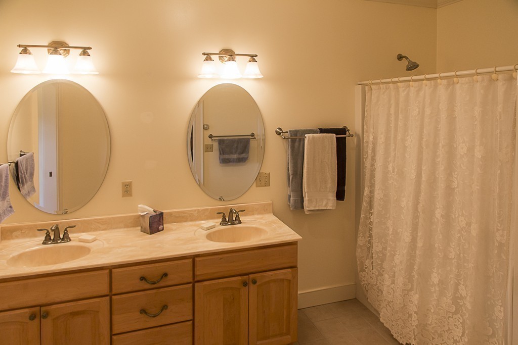 72 Old Stage Road Montague, MA 01351 - Photo 10 of 23 a bathroom with 2 sink and a mirror