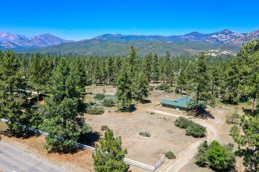 59672 Hop Patch Spring Road Mountain Center, CA 92561 - Photo 1 of 38 a view of a town with mountains in the background