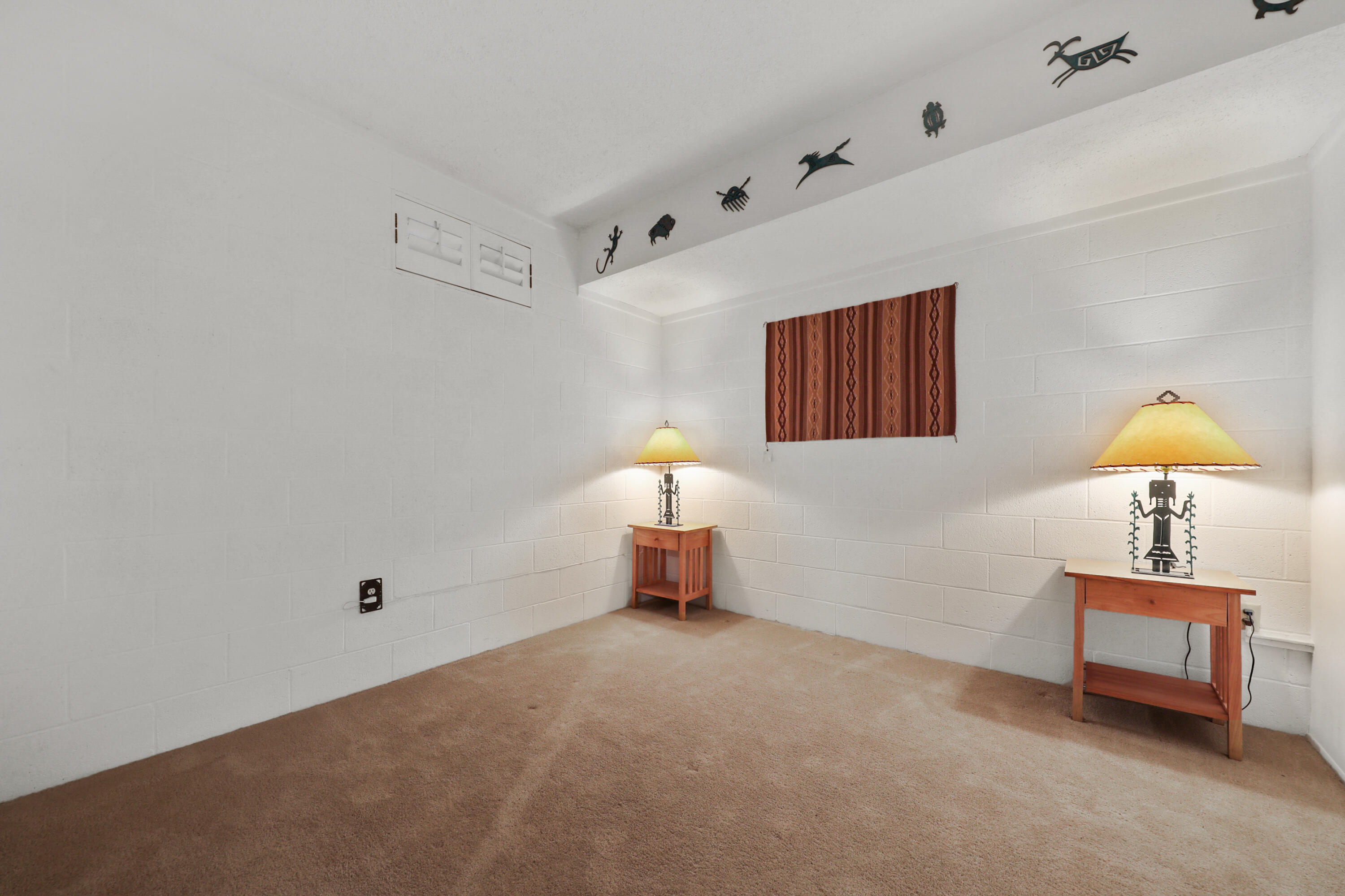 59672 Hop Patch Spring Road Mountain Center, CA 92561 - Photo 26 of 38 a bedroom with a bed and a lamp