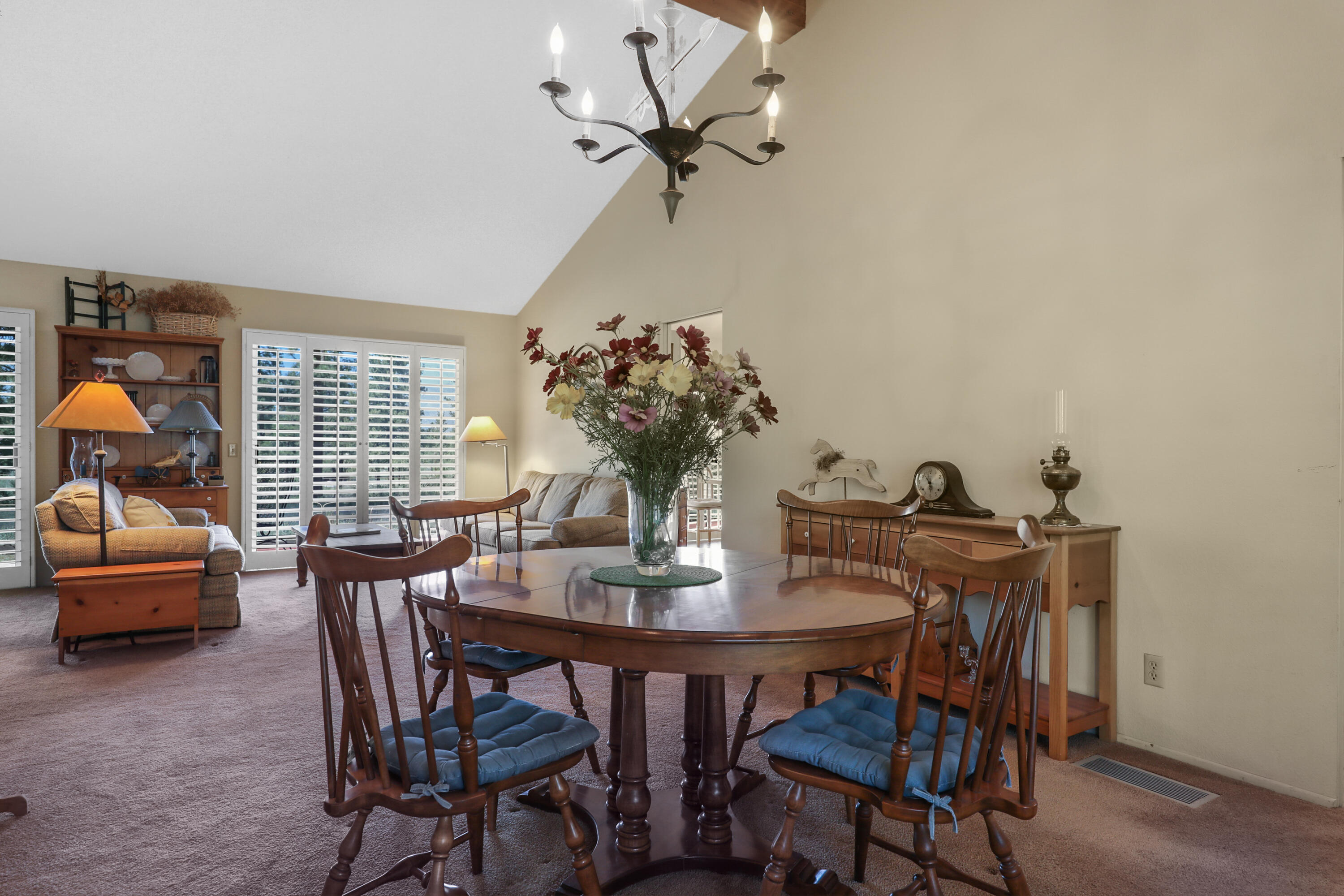 59672 Hop Patch Spring Road Mountain Center, CA 92561 - Photo 9 of 38 a view of a dining room with furniture and a chandelier