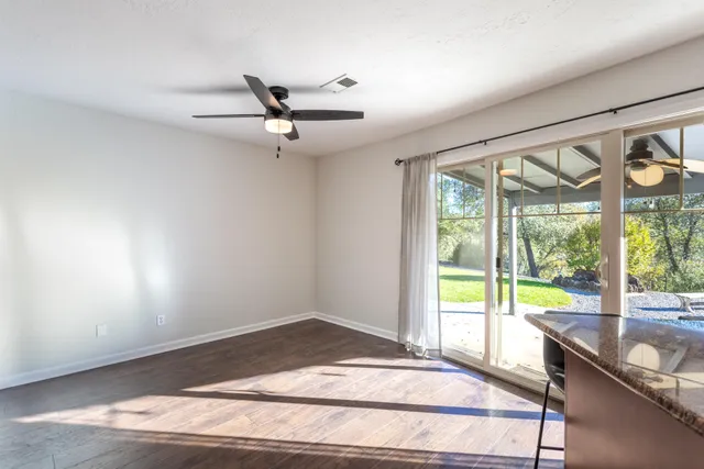 a bathroom with a bathtub a toilet and a shower