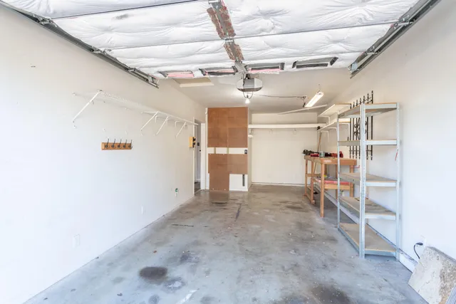 a view of a house with swimming pool and a yard