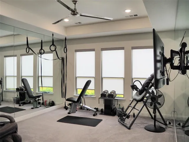 a view of a room with gym equipment