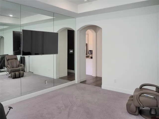 a view of a storage & utility room with two washing machine