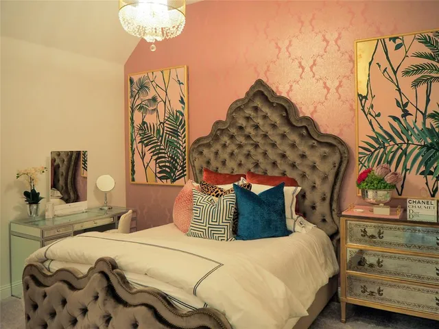 a bedroom with natural light and a bed