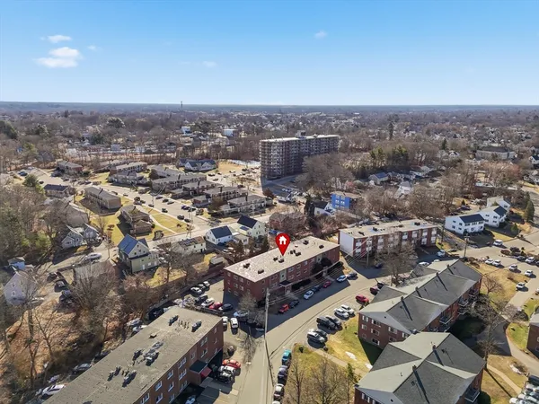 an aerial view of a city with lots of residential buildings