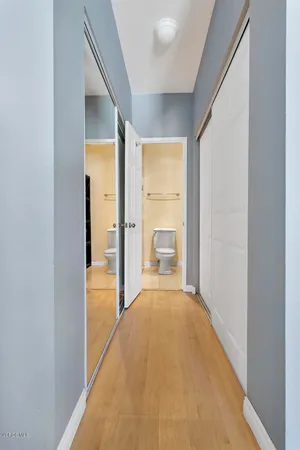 a bedroom with a bed and a table in it