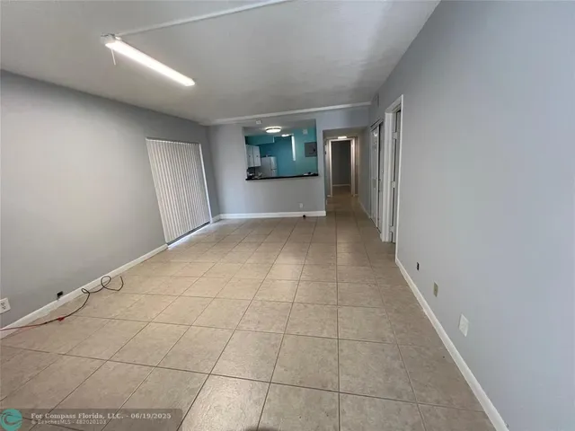 an empty room with a bench