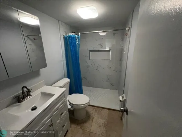 a bathroom with a mirror