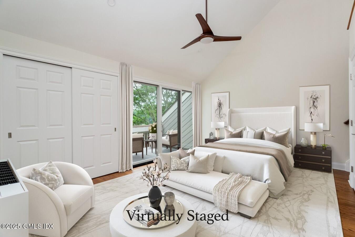 15 River Road, Unit 220 Cos Cob, CT 06807 - Photo 11 of 27 a living room with furniture and a large window