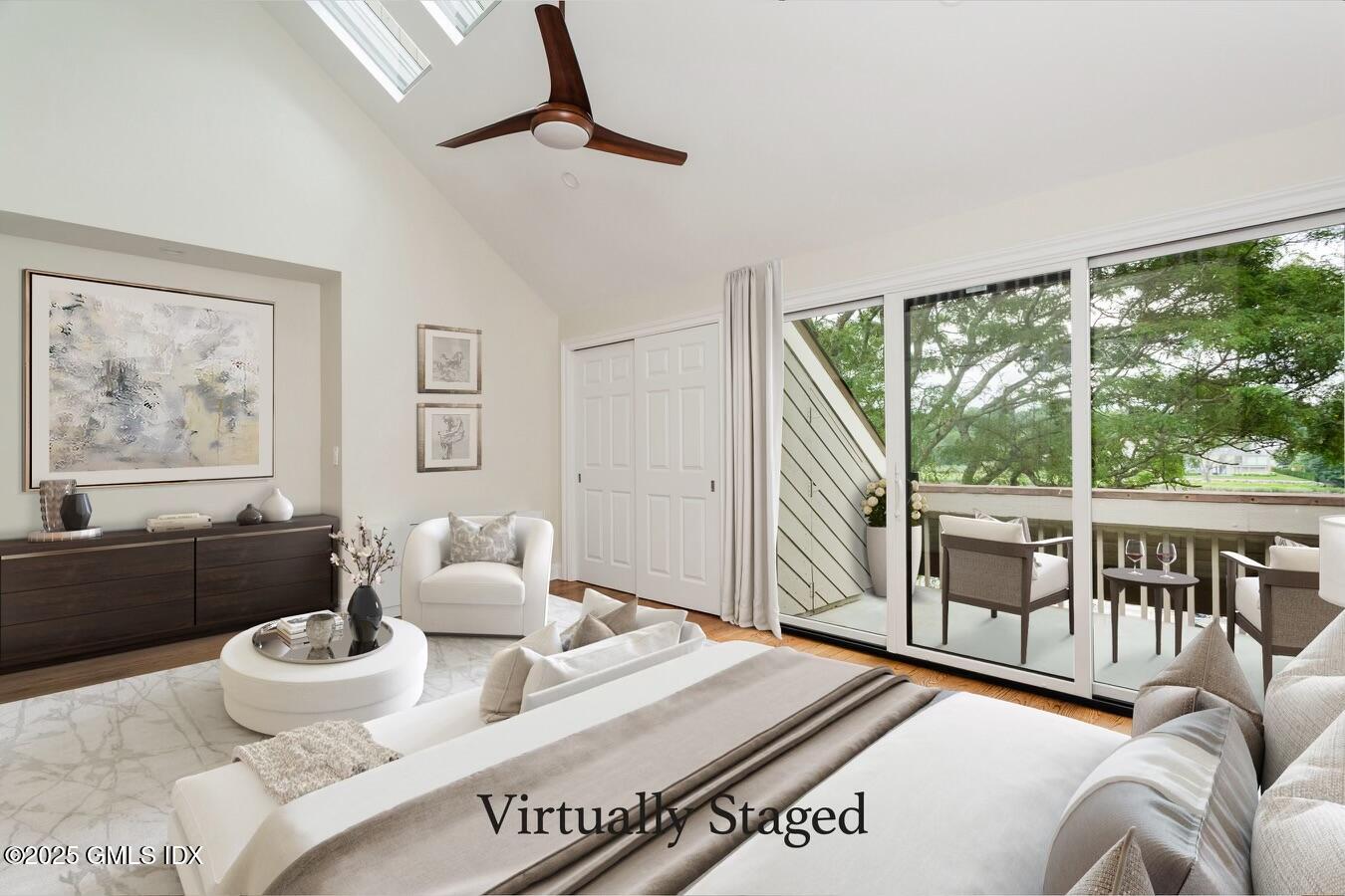 15 River Road, Unit 220 Cos Cob, CT 06807 - Photo 13 of 27 a living room with furniture and a large window