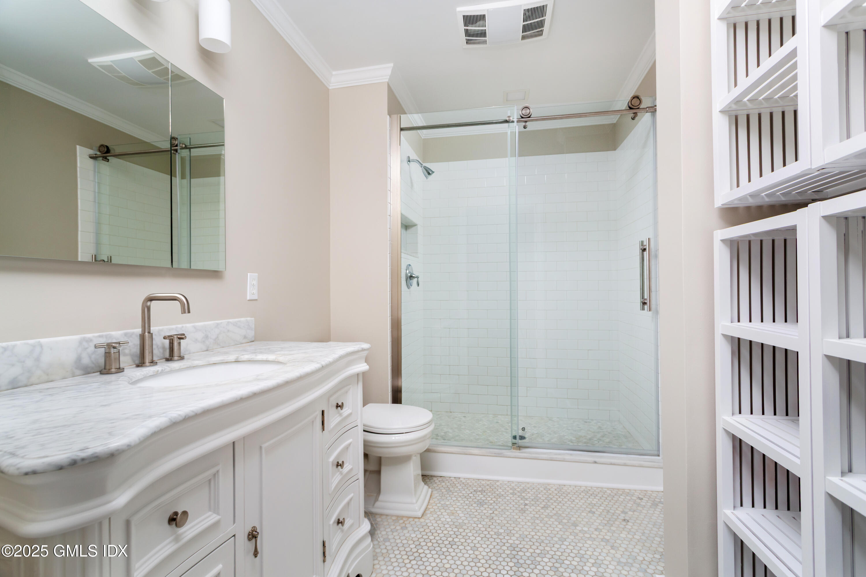 15 River Road, Unit 220 Cos Cob, CT 06807 - Photo 15 of 27 a bathroom with a granite countertop sink toilet and shower