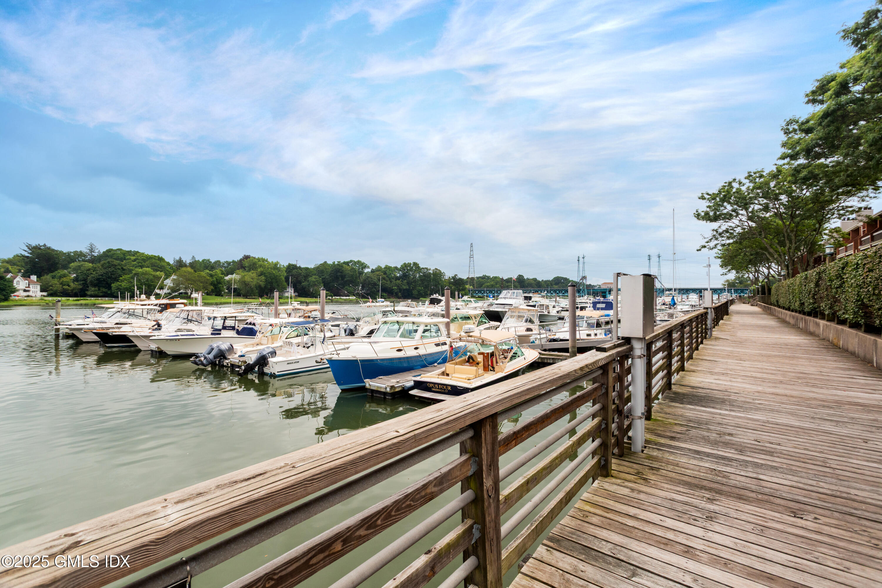 15 River Road, Unit 220 Cos Cob, CT 06807 - Photo 23 of 27 a view of swimming pool with outdoor seating