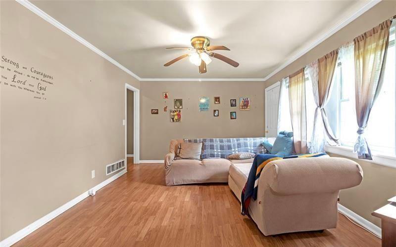 306 Laney Road McDonough, GA 30252 - Photo 14 of 15 a bedroom with a bed and window