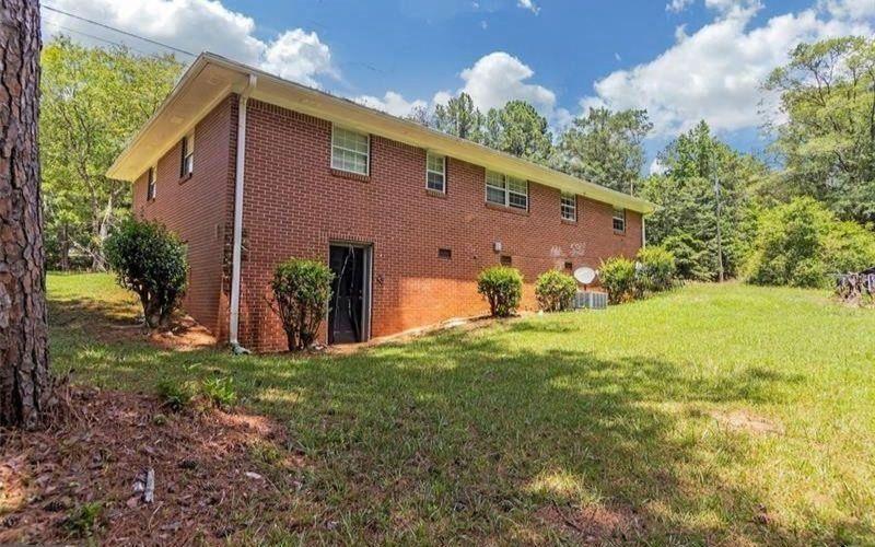 306 Laney Road McDonough, GA 30252 - Photo 9 of 15 a front view of a house with a yard