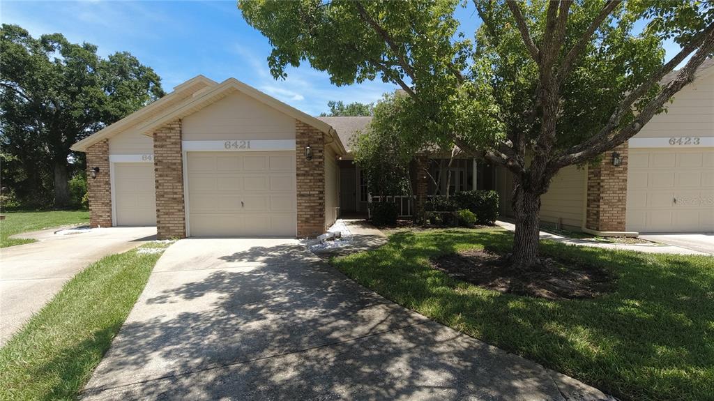 a front view of house with yard