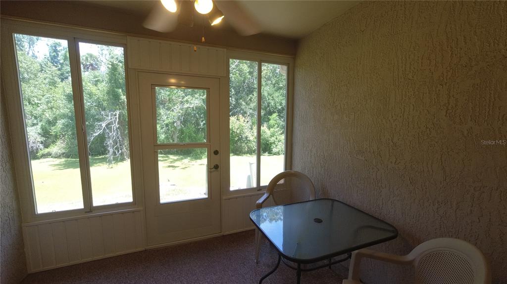 6421 Remus Drive New Port Richey, FL 34653 - Photo 11 of 25 a living room with furniture and a window