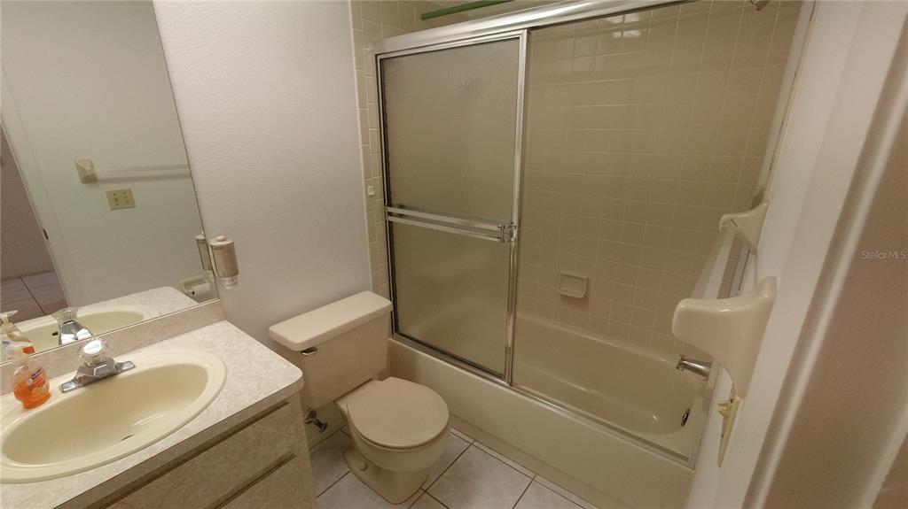 6421 Remus Drive New Port Richey, FL 34653 - Photo 15 of 25 a bathroom with a sink toilet and shower