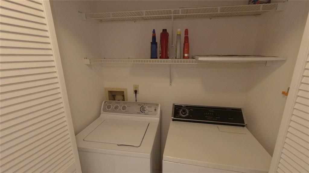 6421 Remus Drive New Port Richey, FL 34653 - Photo 16 of 25 a utility room with dryer and washer