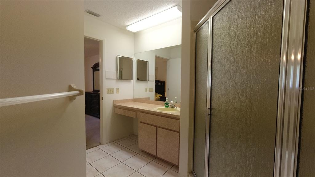 6421 Remus Drive New Port Richey, FL 34653 - Photo 20 of 25 a bathroom with a sink toilet and mirror