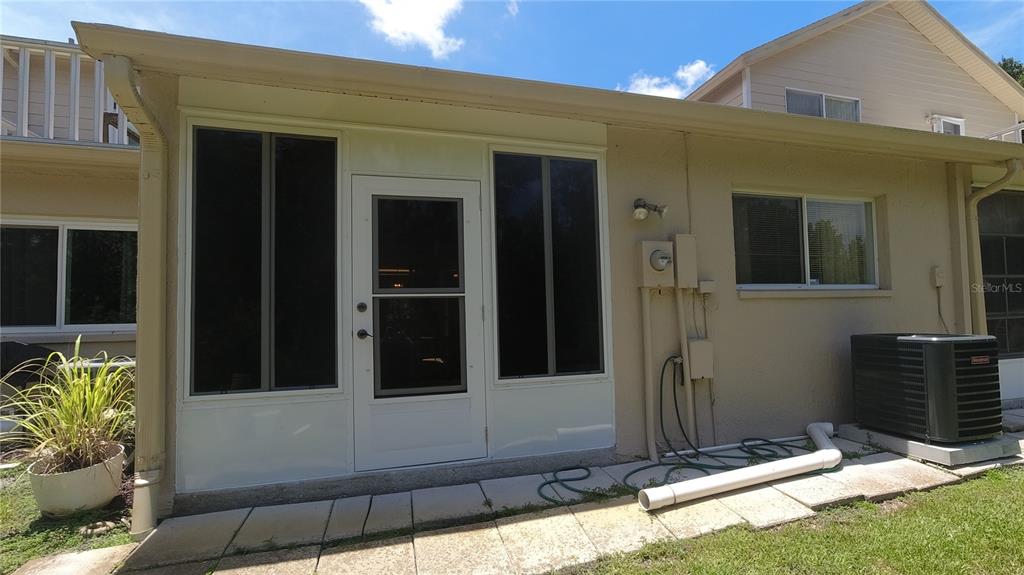 6421 Remus Drive New Port Richey, FL 34653 - Photo 21 of 25 a view of house with yard