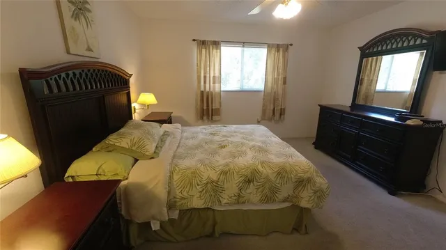 a bedroom with a bed and furniture