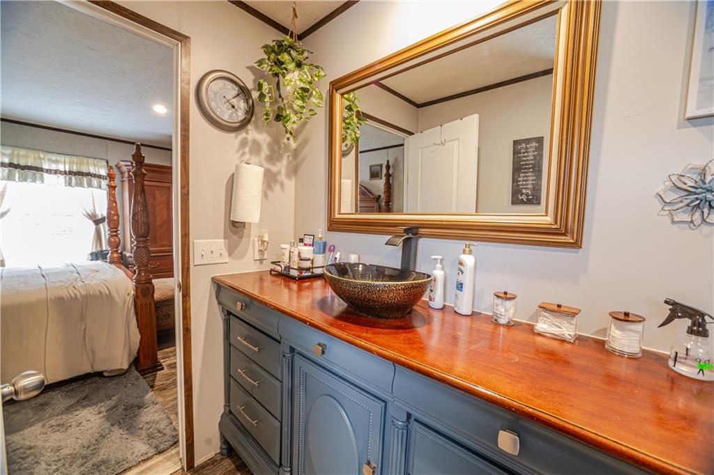 127 Georgia Drive Hartwell, GA 30643 - Photo 8 of 21 a bathroom with a sink and a mirror